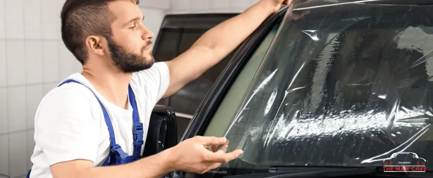 TMC - Technician tinting a car window